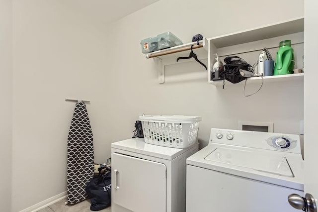 18115 Linden Forest Ln, Katy, TX 77449 - washroom featuring washer and clothes dryer and baseboards
