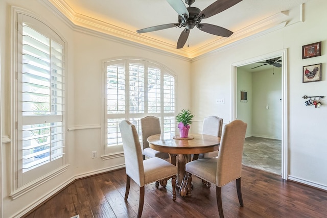 147 Sunnyvale W, Montgomery, TX 77356 - dining space with ornamental molding, ceiling fan, dark wood-type flooring, and baseboards