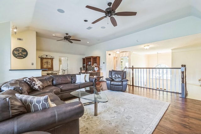 147 Sunnyvale W, Montgomery, TX 77356 - living room with ceiling fan, vaulted ceiling, and wood finished floors