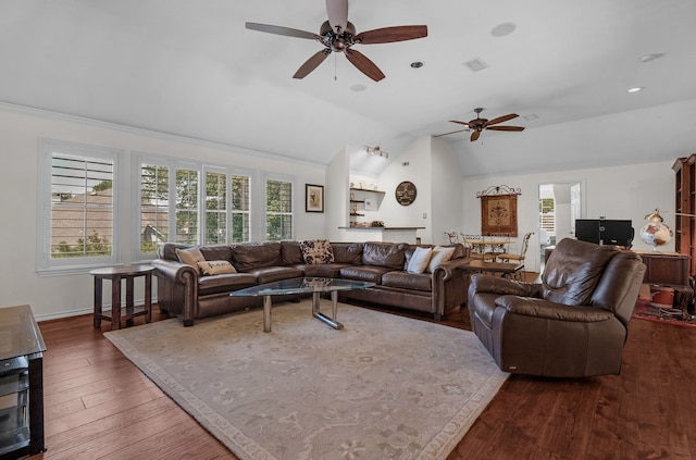 147 Sunnyvale W, Montgomery, TX 77356 - living area featuring ceiling fan, lofted ceiling, dark wood-style floors, and ornamental molding
