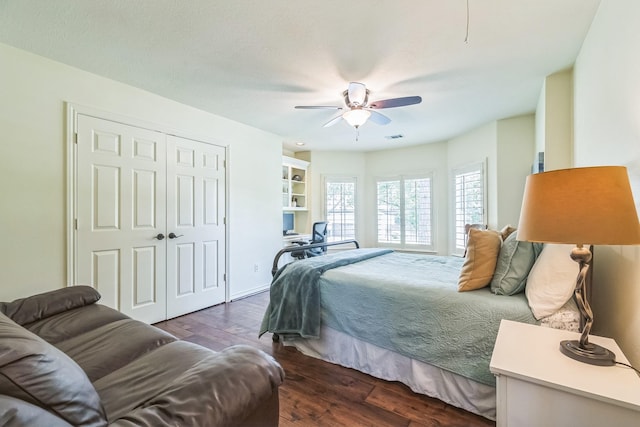 147 Sunnyvale W, Montgomery, TX 77356 - bedroom with dark wood-style floors, a closet, and ceiling fan