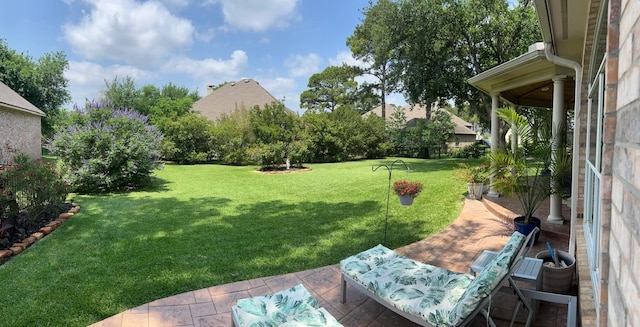 147 Sunnyvale W, Montgomery, TX 77356 - view of grassy yard featuring a patio