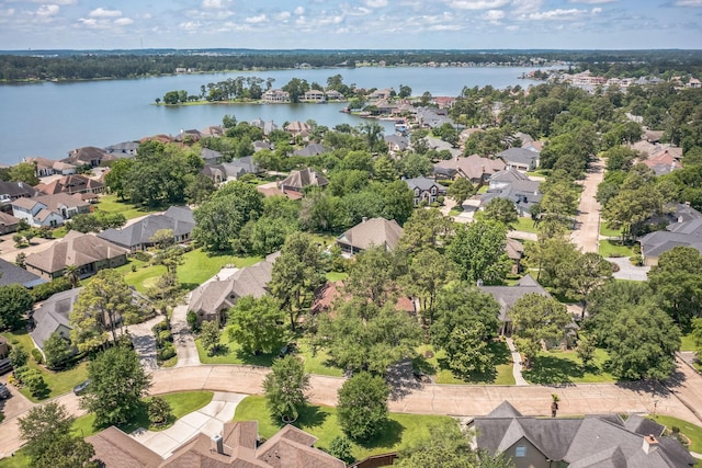 147 Sunnyvale W, Montgomery, TX 77356 - aerial perspective of suburban area with a nearby body of water