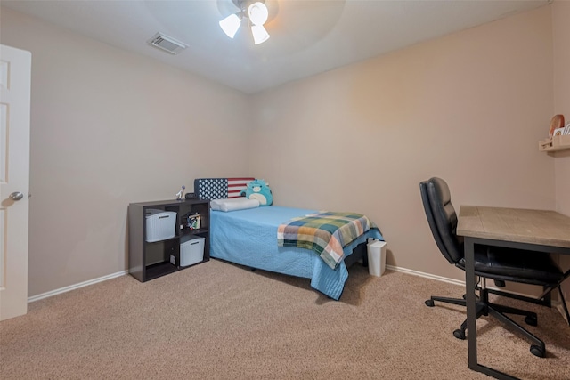 bedroom featuring carpet, baseboards, and a ceiling fan