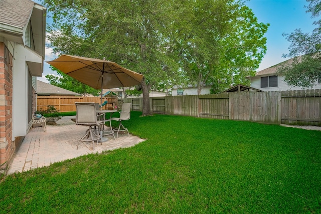 view of yard with a patio area