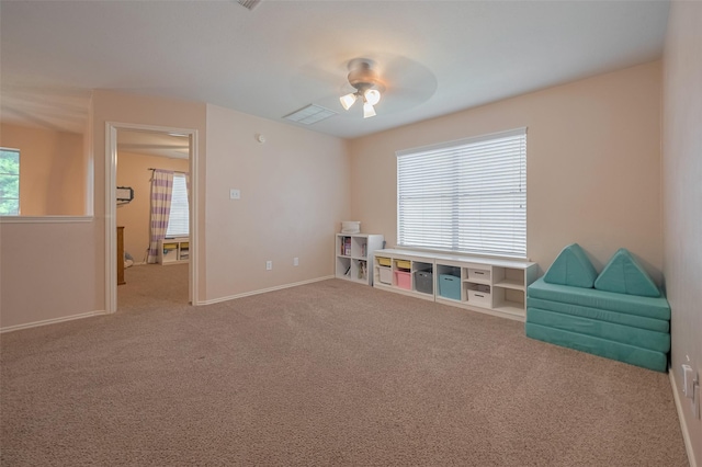 game room featuring a ceiling fan, carpet, and baseboards