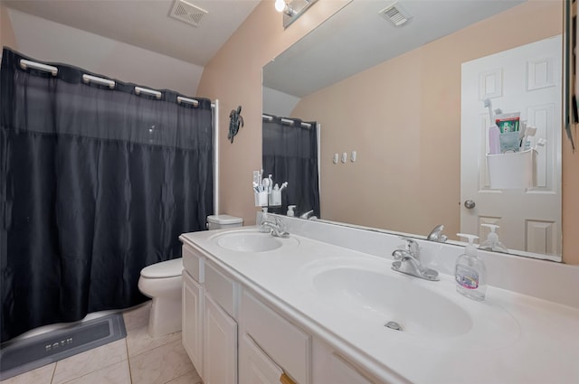 bathroom with toilet, double vanity, and a shower with curtain