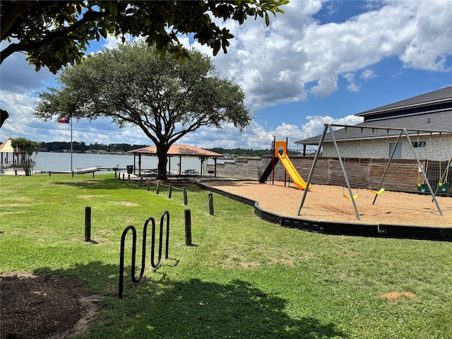 view of home's community with a gazebo and a water view
