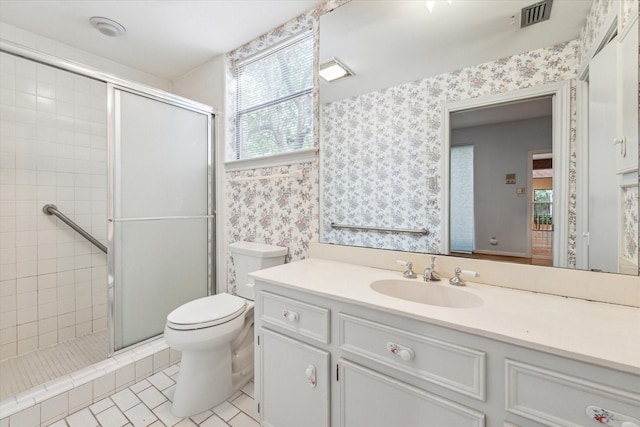 bathroom with wallpapered walls, toilet, a shower stall, vanity, and tile patterned floors