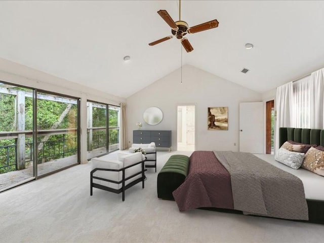 bedroom with lofted ceiling, ceiling fan, and light colored carpet
