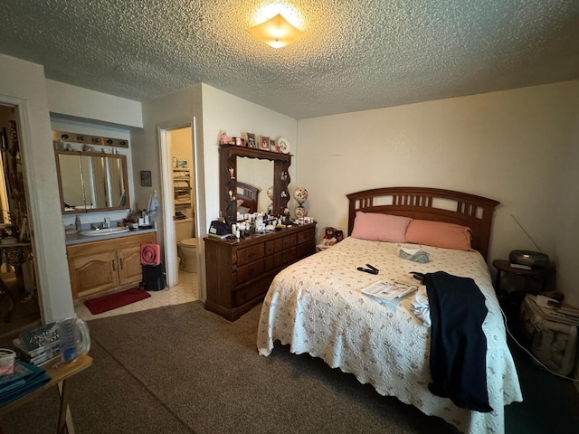 1450 Allegro Dr, Dallas, TX 75241 - carpeted bedroom with a sink and a textured ceiling