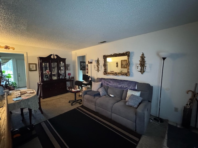 1450 Allegro Dr, Dallas, TX 75241 - carpeted living area with a textured ceiling