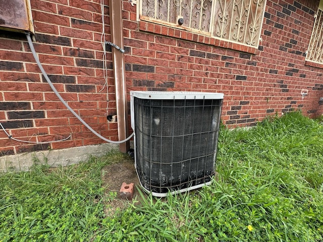 1450 Allegro Dr, Dallas, TX 75241 - exterior view of cooling unit and brick siding