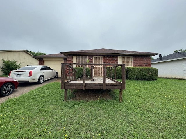 1450 Allegro Dr, Dallas, TX 75241 - view of front of home with an attached garage, brick siding, a front yard, a wooden deck, and roof with shingles