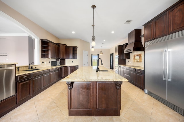 4343 Schlipf Rd, Katy, TX 77493 - kitchen with appliances with stainless steel finishes, open shelves, a sink, custom range hood, and recessed lighting