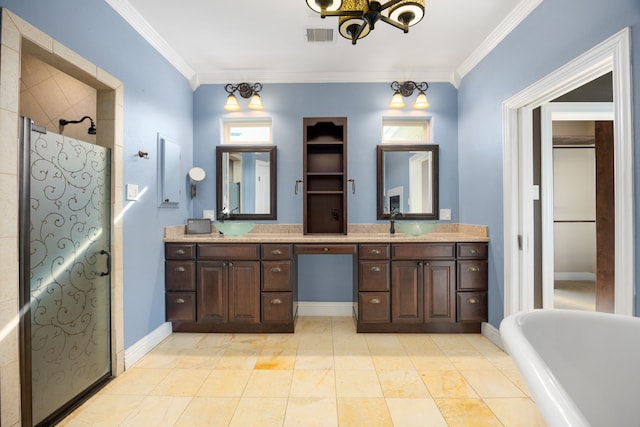 4343 Schlipf Rd, Katy, TX 77493 - full bath featuring tiled shower, ornamental molding, double vanity, a soaking tub, and baseboards
