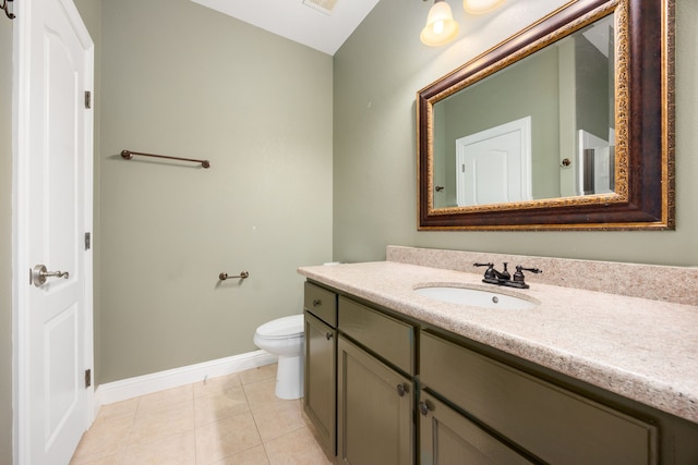 4343 Schlipf Rd, Katy, TX 77493 - bathroom with baseboards, vanity, toilet, and tile patterned floors
