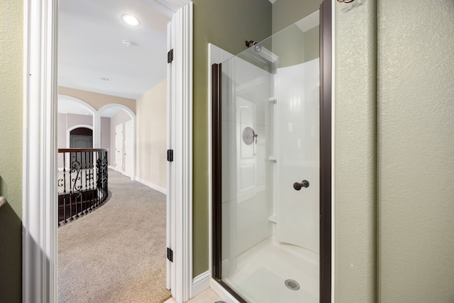 4343 Schlipf Rd, Katy, TX 77493 - bathroom with a stall shower and baseboards