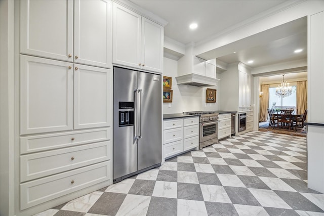 7603 Olympia Dr, Houston, TX 77063 - kitchen featuring high quality appliances, ornamental molding, a chandelier, white cabinets, and dark countertops
