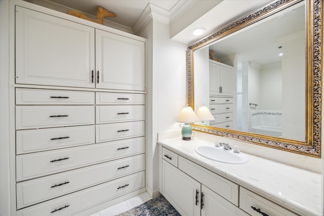 7603 Olympia Dr, Houston, TX 77063 - bathroom featuring ornamental molding, vanity, and tile patterned flooring