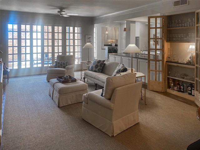 7603 Olympia Dr, Houston, TX 77063 - living area with crown molding and ceiling fan