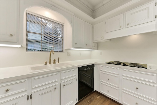 kitchen featuring black appliances, a sink, white cabinets, and light countertops
