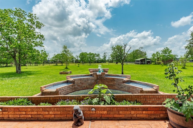 11413 7th St, Santa Fe, TX 77510 - view of property's community with a lawn