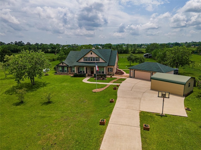 11413 7th St, Santa Fe, TX 77510 - view of front facade with covered porch, an outdoor structure, a front yard, and driveway