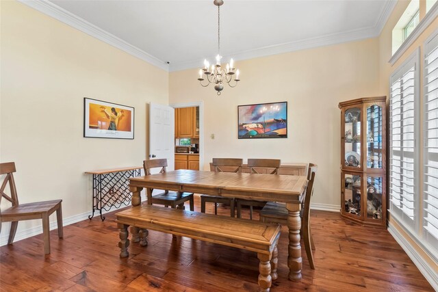 11413 7th St, Santa Fe, TX 77510 - dining room with crown molding, a chandelier, baseboards, and wood finished floors