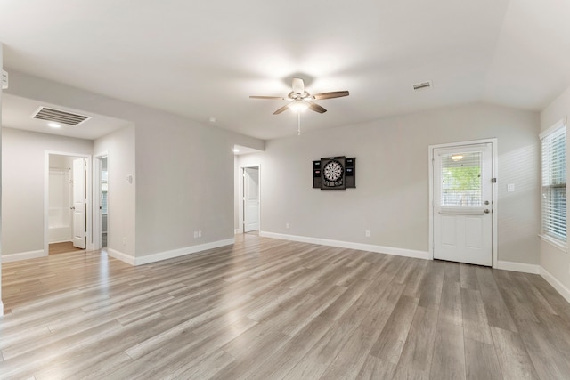 unfurnished living room with a ceiling fan, light wood finished floors, and baseboards