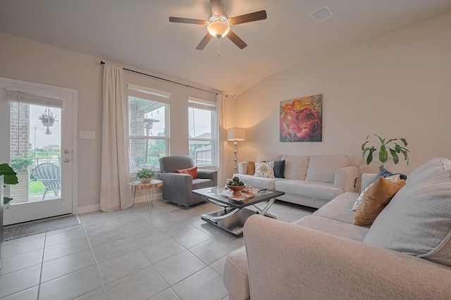 4314 Reese Ravine Ln, Katy, TX 77493 - living room featuring plenty of natural light, lofted ceiling, light tile patterned floors, and a ceiling fan