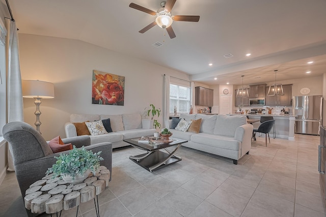 4314 Reese Ravine Ln, Katy, TX 77493 - living area with ceiling fan, recessed lighting, light tile patterned floors, and lofted ceiling