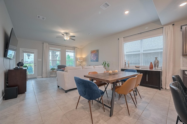 4314 Reese Ravine Ln, Katy, TX 77493 - dining space with light tile patterned floors, a ceiling fan, vaulted ceiling, baseboards, and recessed lighting