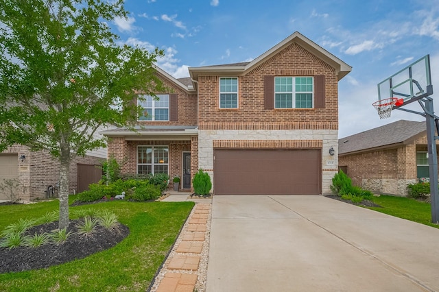 4314 Reese Ravine Ln, Katy, TX 77493 - view of front of property with brick siding, driveway, an attached garage, and a front lawn