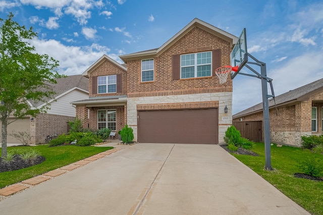 4314 Reese Ravine Ln, Katy, TX 77493 - view of front of home featuring brick siding, a garage, driveway, and a front yard