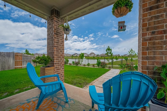 4314 Reese Ravine Ln, Katy, TX 77493 - view of patio with a water view and a residential view