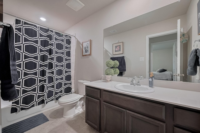 4314 Reese Ravine Ln, Katy, TX 77493 - full bathroom featuring tile patterned flooring, toilet, vanity, and shower / bath combo