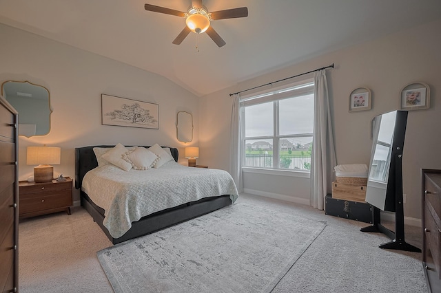 4314 Reese Ravine Ln, Katy, TX 77493 - bedroom with carpet floors, lofted ceiling, baseboards, and a ceiling fan