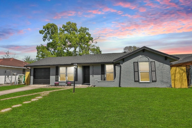 5506 Karelian Dr, Houston, TX 77091 - ranch-style house featuring driveway, brick siding, a garage, and a front yard