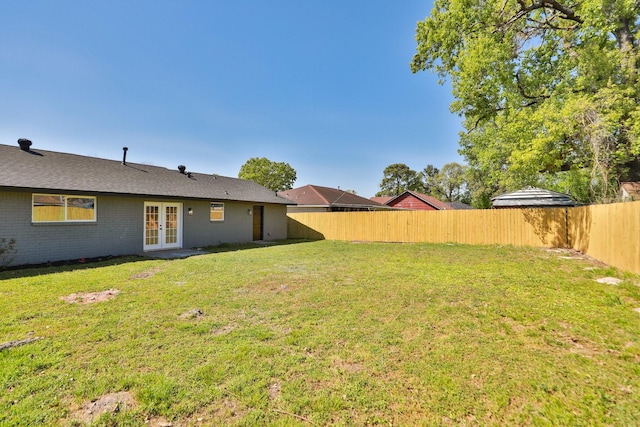 5506 Karelian Dr, Houston, TX 77091 - view of yard featuring french doors