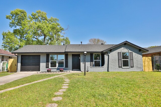 5506 Karelian Dr, Houston, TX 77091 - single story home with an attached garage, brick siding, concrete driveway, and roof with shingles