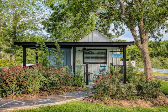 view of outbuilding featuring covered porch