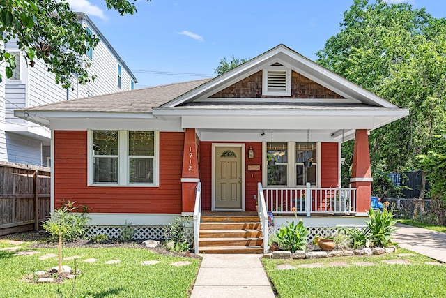 1912 Shearn St, Houston, TX 77007 - view of front facade with a porch and roof with shingles