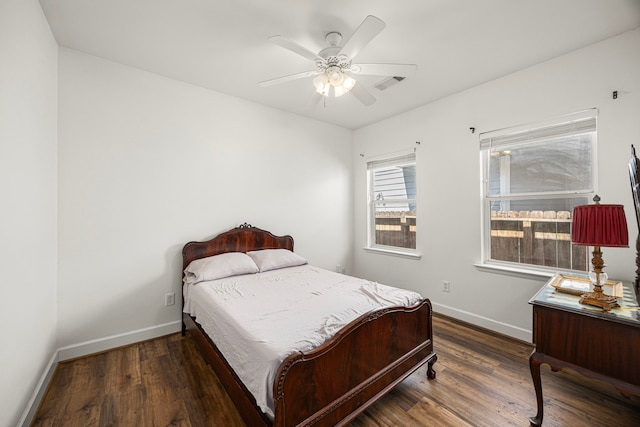 1912 Shearn St, Houston, TX 77007 - bedroom with baseboards, wood finished floors, and a ceiling fan
