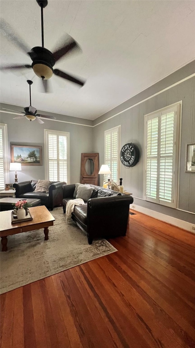 636 S Franklin, La Grange, TX 78945 - living room with wood finished floors, plenty of natural light, and a ceiling fan