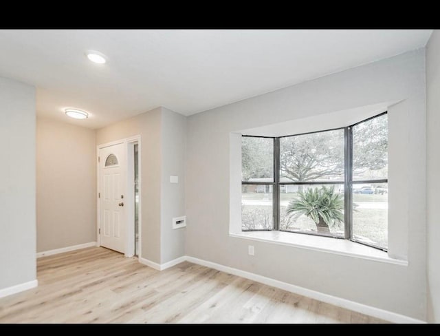 148 Seaside Ln, Texas City, TX 77590 - foyer with wood finished floors and baseboards