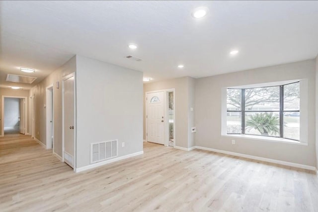 148 Seaside Ln, Texas City, TX 77590 - spare room with light wood-style flooring, baseboards, and recessed lighting
