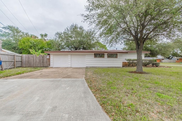 148 Seaside Ln, Texas City, TX 77590 - ranch-style home with concrete driveway and an attached garage