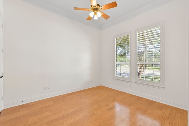 8611 Springmere Ct, Houston, TX 77095 - spare room with light wood finished floors, baseboards, ornamental molding, and ceiling fan
