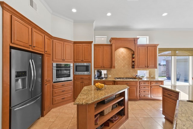 8611 Springmere Ct, Houston, TX 77095 - kitchen featuring appliances with stainless steel finishes, crown molding, open shelves, tasteful backsplash, and brown cabinets